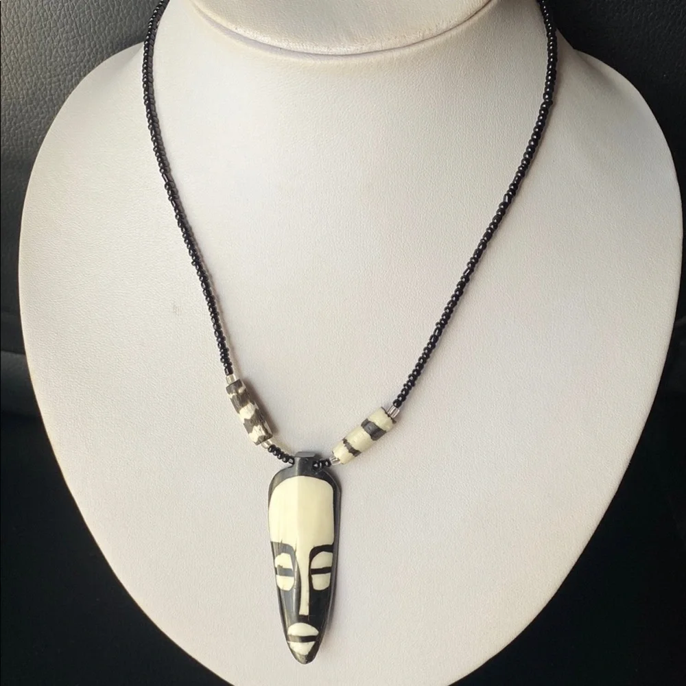Black and Cream Beaded Necklace with Mask Pendant
